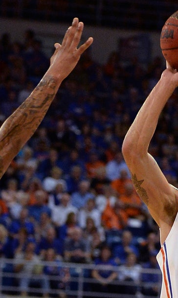 Late free throws help No. 2 Florida slip past Auburn